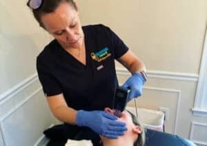 Woman receiving Morpheus8 treatment