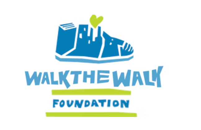Walk The Walk Foundation logo with shoe design.
