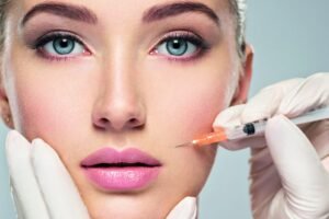 Woman receiving facial cosmetic injection in cheek Annapolis MD
